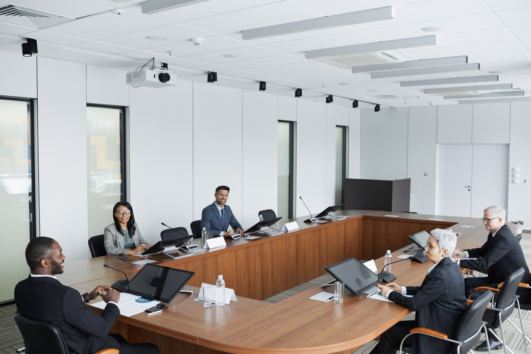 People Sitting at Conference Table